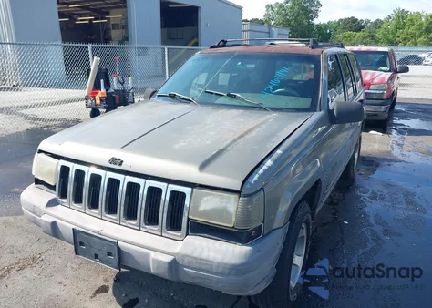 1997 Jeep Grand Cherokee Laredo/Tsi из США, поврежденный, VIN 1J4FX58S1VC514156